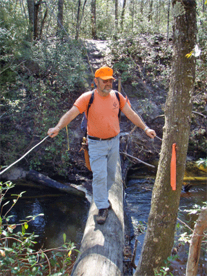Captain Richard Walker on the log bridge